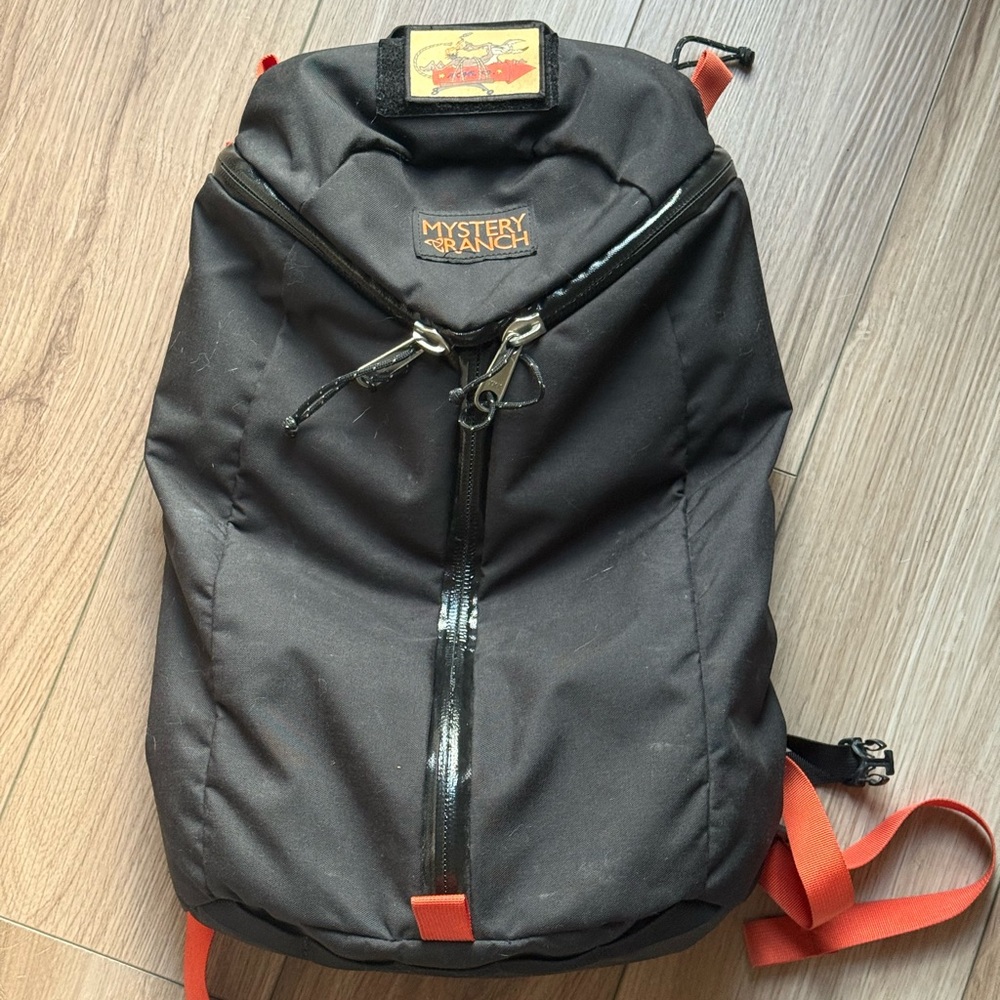 MYSTERY RANCH Black Backpack with Orange Accents